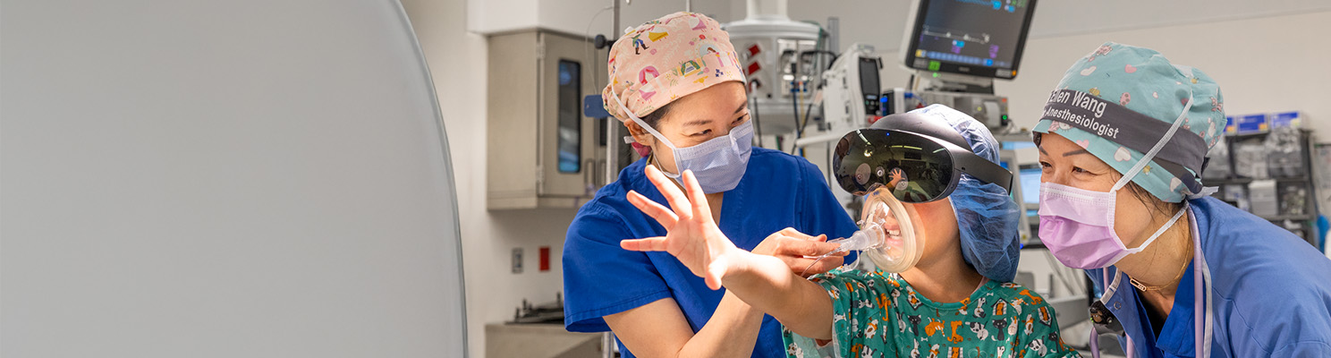 Patient using VR for play and distraction.